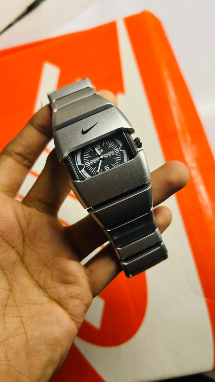 WhatsApp Image 2026-04-12 at 1.35.59 PM (1) Nike Vintage Watch – Lightweight Polycarbon Design - Image 1